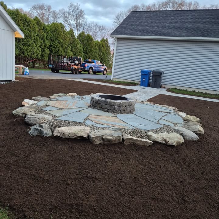 Stone fire pit landscaping